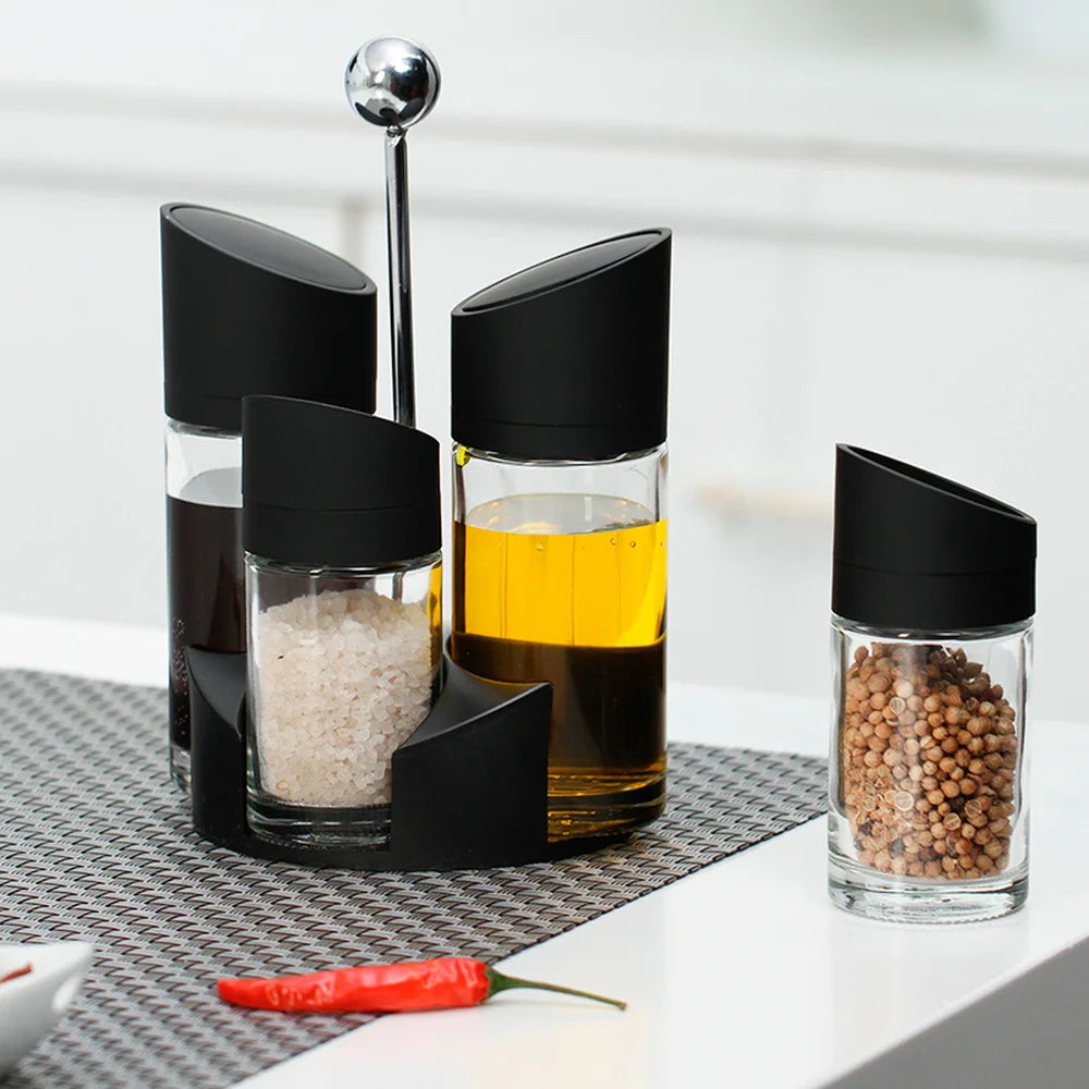 Spice Carousel: This 5-piece rotating cruet set is the perfect kitchen storage solution for your salt, pepper, oil, and vinegar.