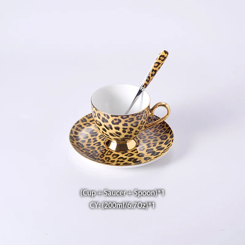 Wild Grace Collection: A sophisticated porcelain tea and coffee set featuring a bold leopard print, including a teapot, cups, sugar bowl, and creamer.