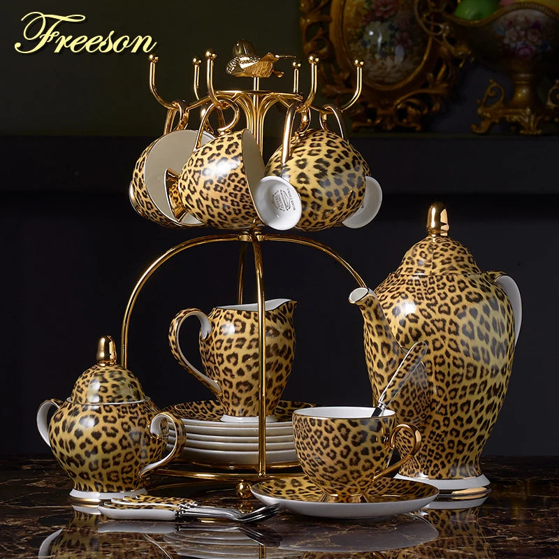 Wild Grace Collection: A sophisticated porcelain tea and coffee set featuring a bold leopard print, including a teapot, cups, sugar bowl, and creamer.