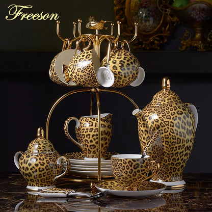 Wild Grace Collection: A sophisticated porcelain tea and coffee set featuring a bold leopard print, including a teapot, cups, sugar bowl, and creamer.
