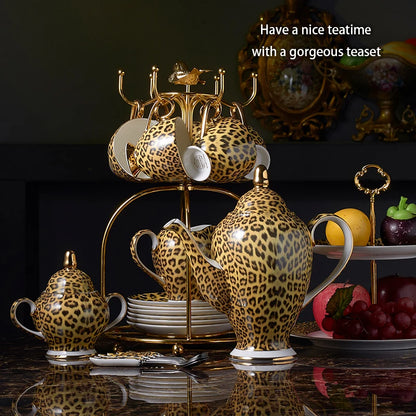 Wild Grace Collection: A sophisticated porcelain tea and coffee set featuring a bold leopard print, including a teapot, cups, sugar bowl, and creamer.