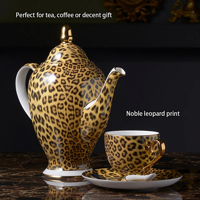 Wild Grace Collection: A sophisticated porcelain tea and coffee set featuring a bold leopard print, including a teapot, cups, sugar bowl, and creamer.